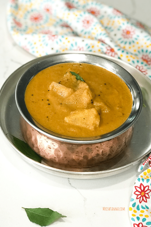 A bowl of pineapple curry on the plate 
