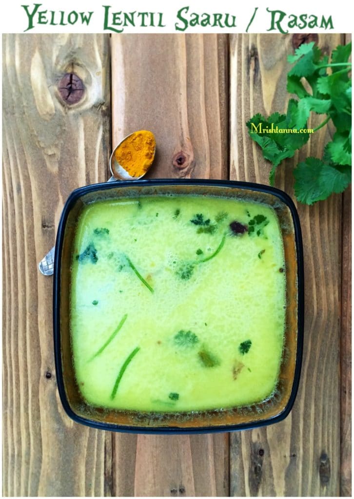 A close up of food on a table, with Dal and Rasam