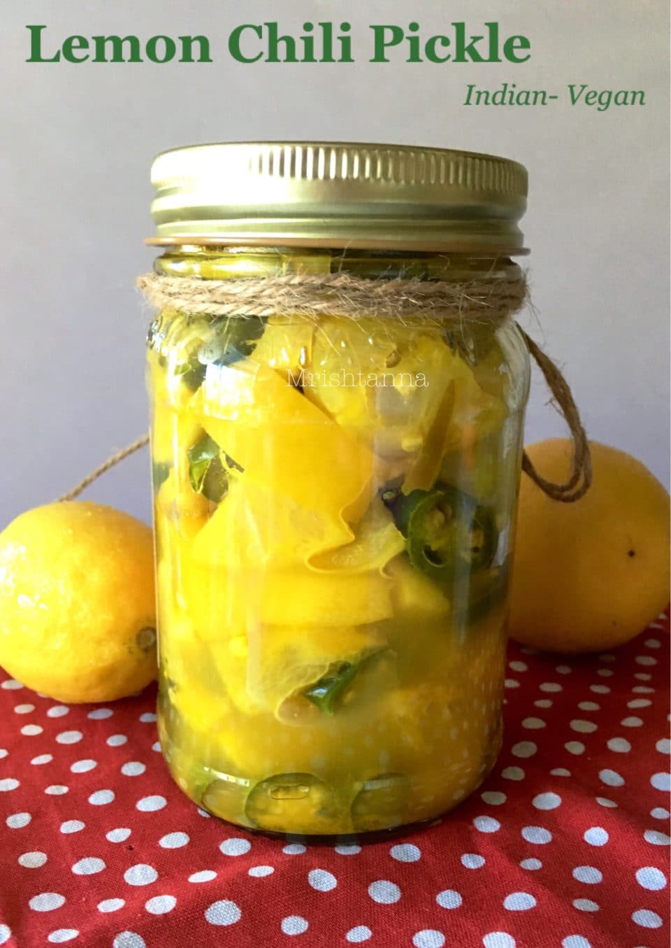 Lemon chili pickle is on the glass jar