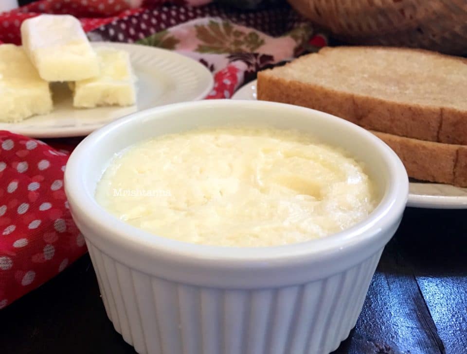A cup of butter on a table, with Vegan Butter
