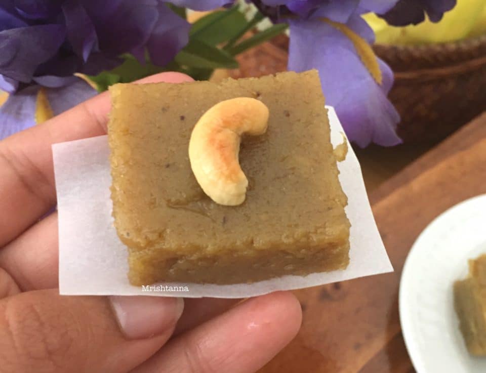 A piece plantain halwa and topped with cashews