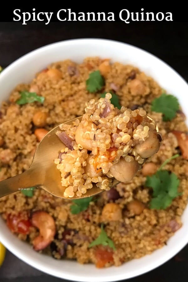 A plate of food with chana and vegetables, with Quinoa