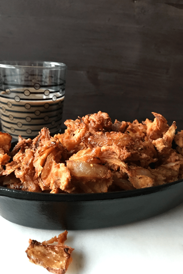 A bowl of Onion Pakoda is on the table