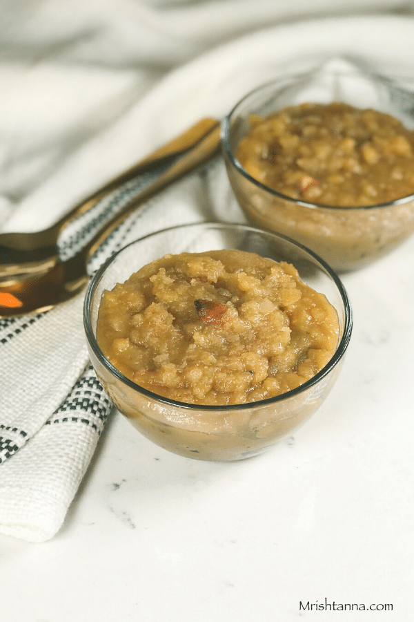 A plate of food on a table, with Jaggery and chana dal