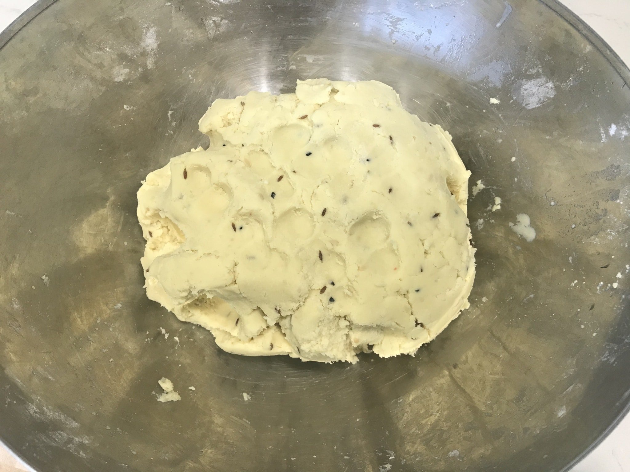 A bowl is filled with chakli dough