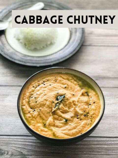 A bowl of cabbage chutney is over the table