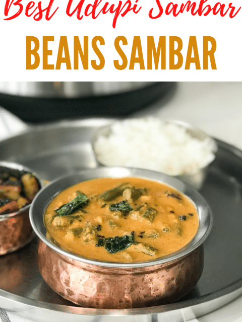 A bowl of Sambar placed on the steel plate