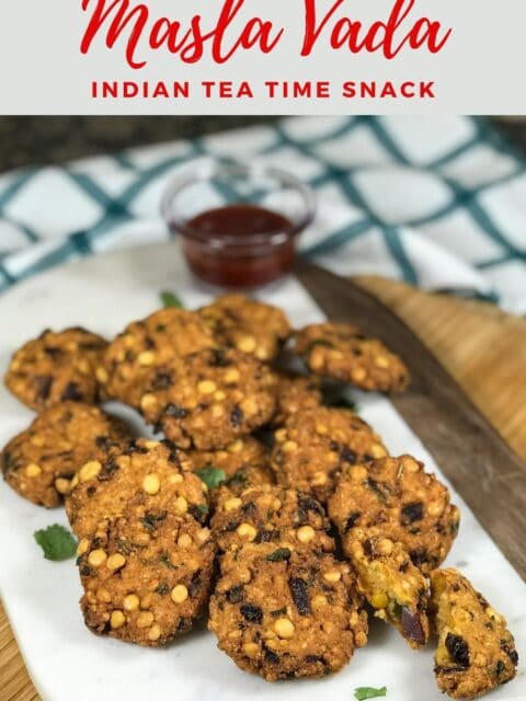 Masala Vadas are placed on the white serving tray