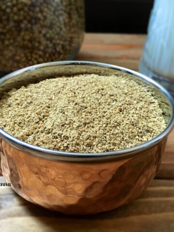 A bowl of kashaya powder sitting on a table, with Powder and Spice