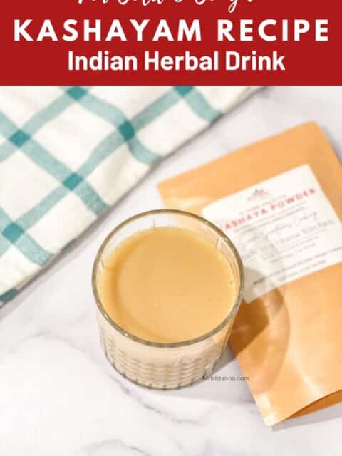 Traditional Indian herbal drink made with kashaya powder, served warm in a glass.