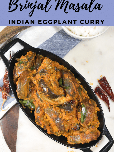 A plate of eggplant Masala curry is on the table