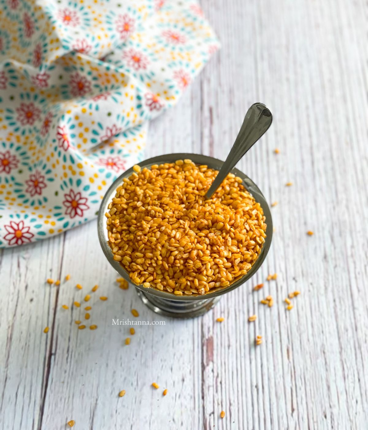 A bowl of roasted moong dal is on the table.