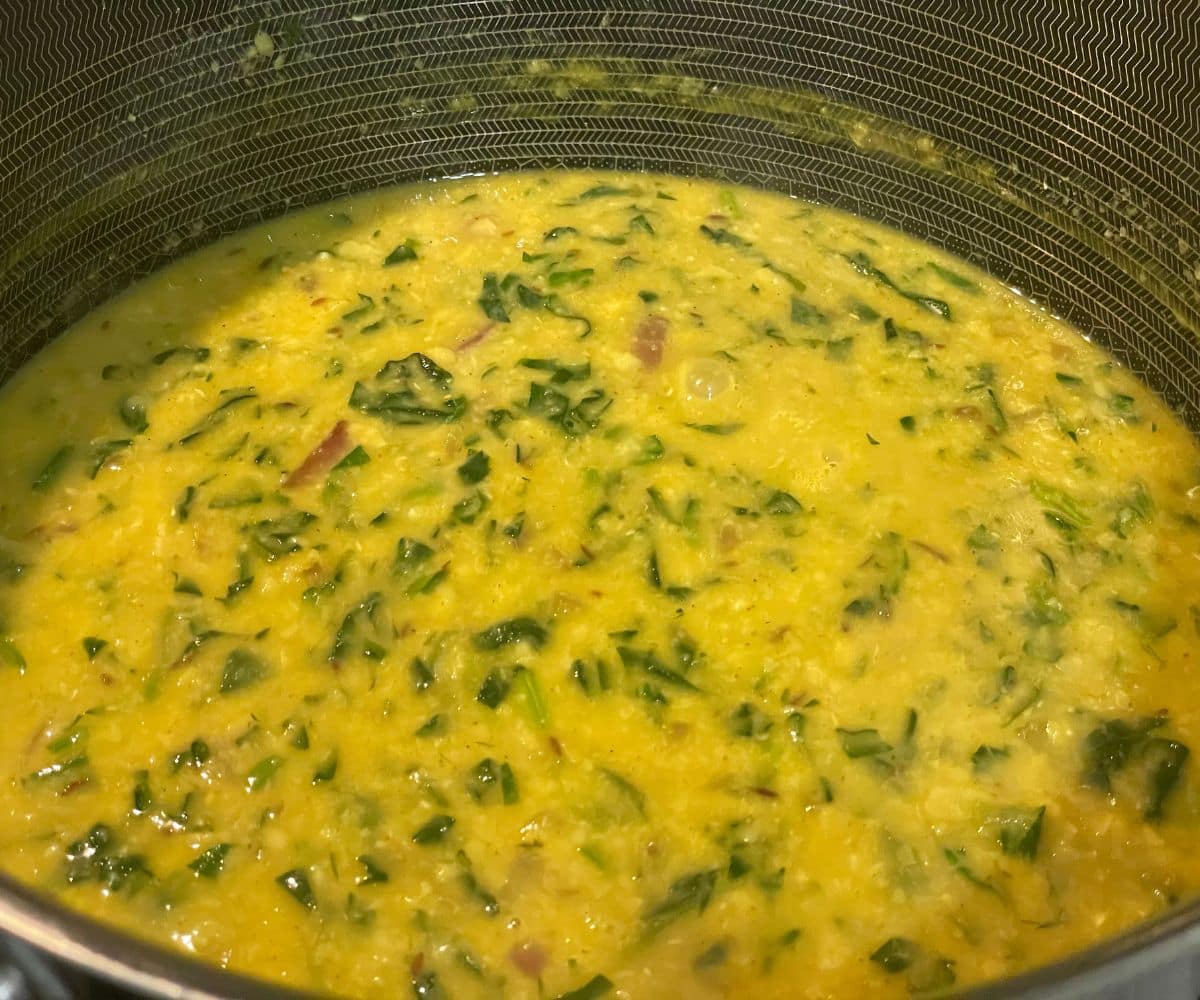 A pan is with spinach dal.