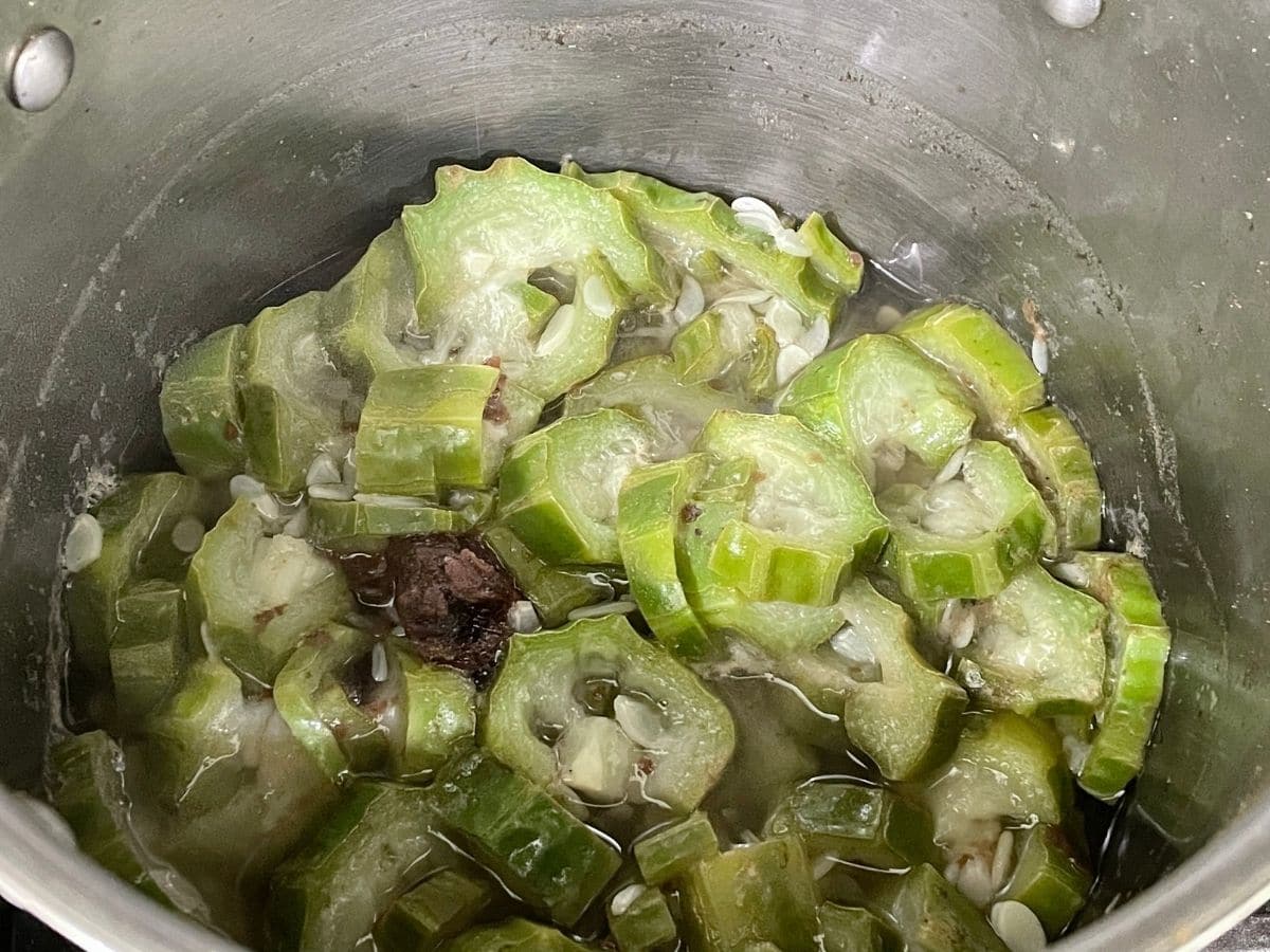 A pot is with cooked ridge gourd.