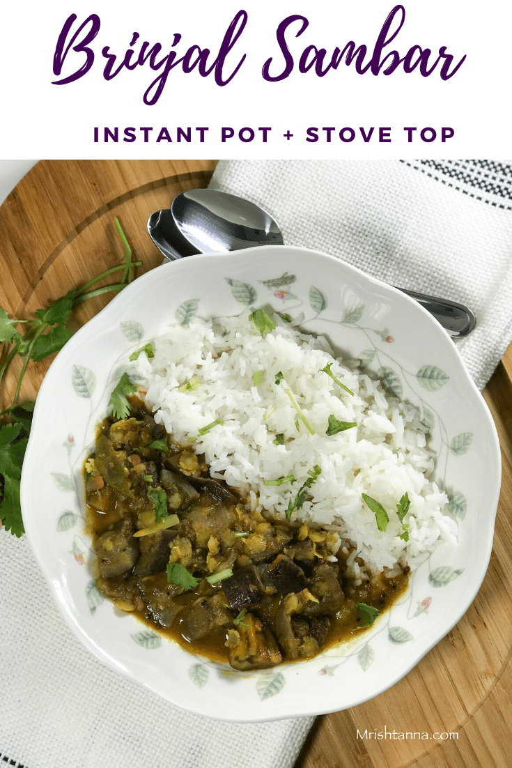 A plate is with Eggplant Sambar and rice and placed on the serving tray