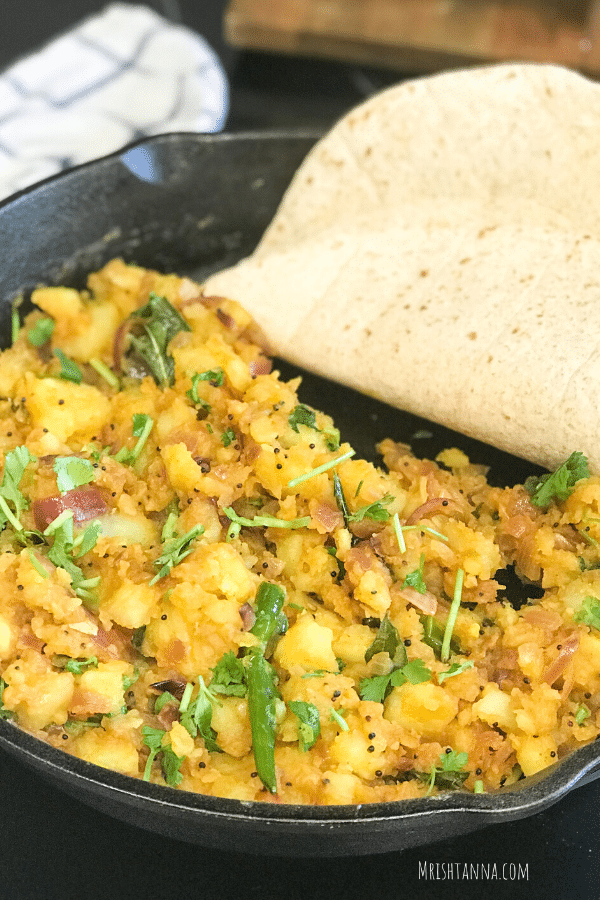 Close up of potato curry which is placed on the pan.