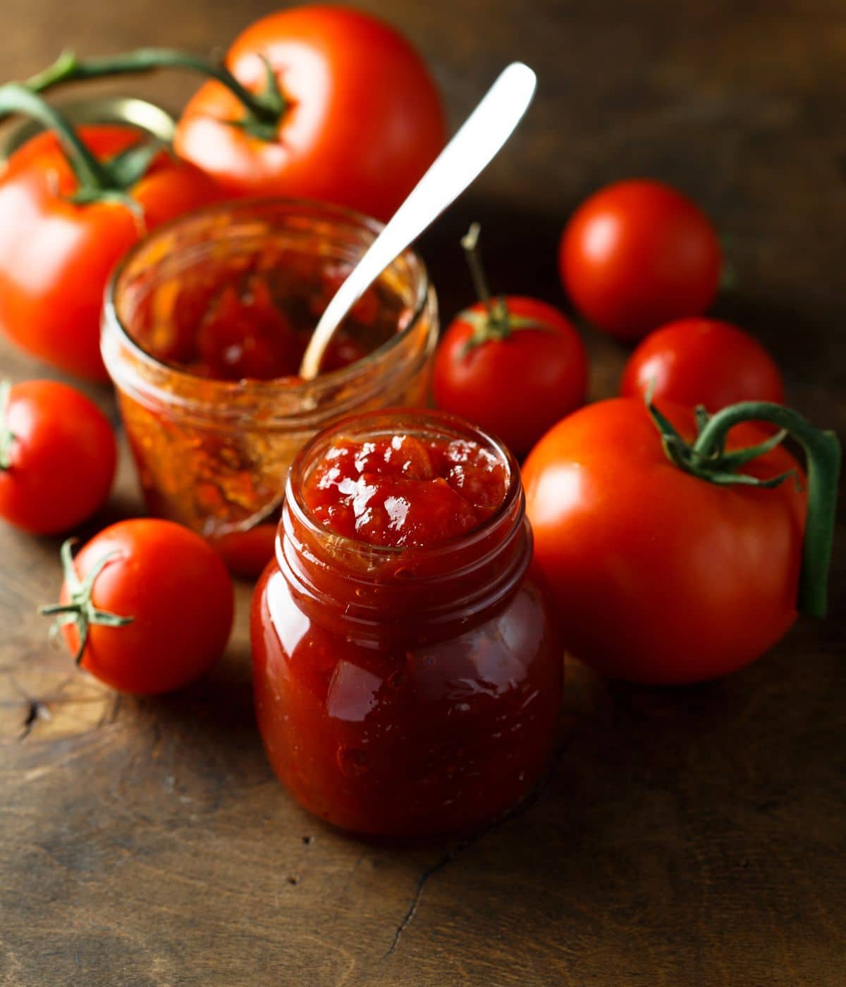 A jar is filled with tomato jam.