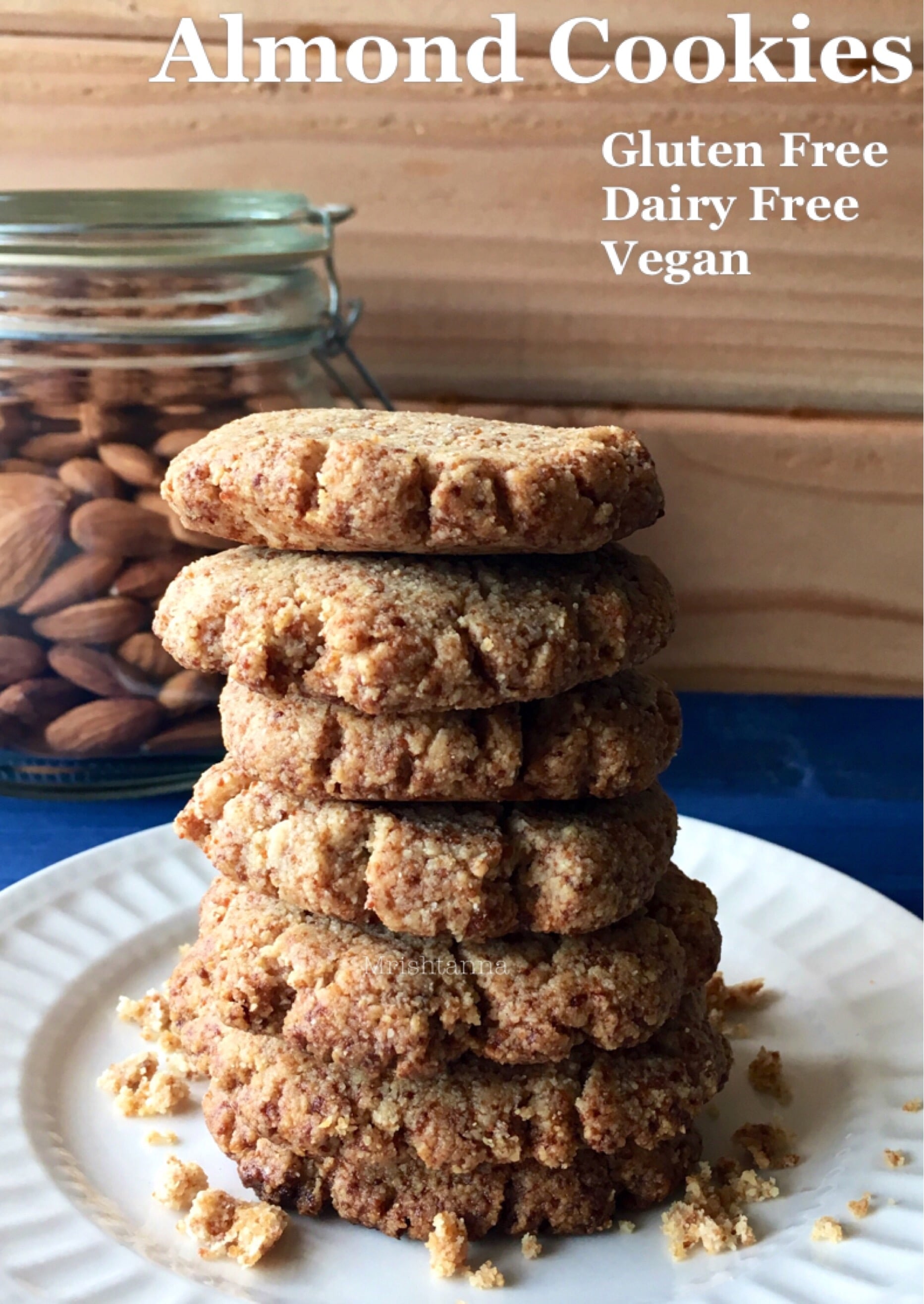 Vegan Almond Cookies are stacked on the plate 