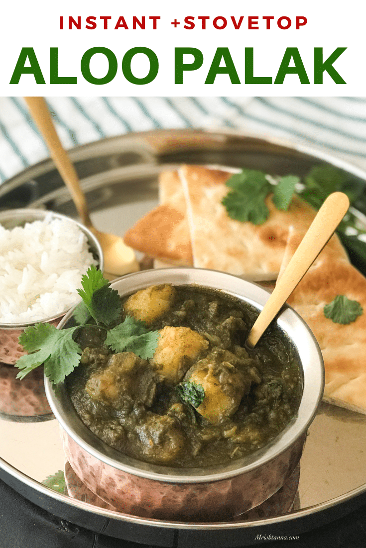 A bowl of food on a plate, with Spinach and Curry