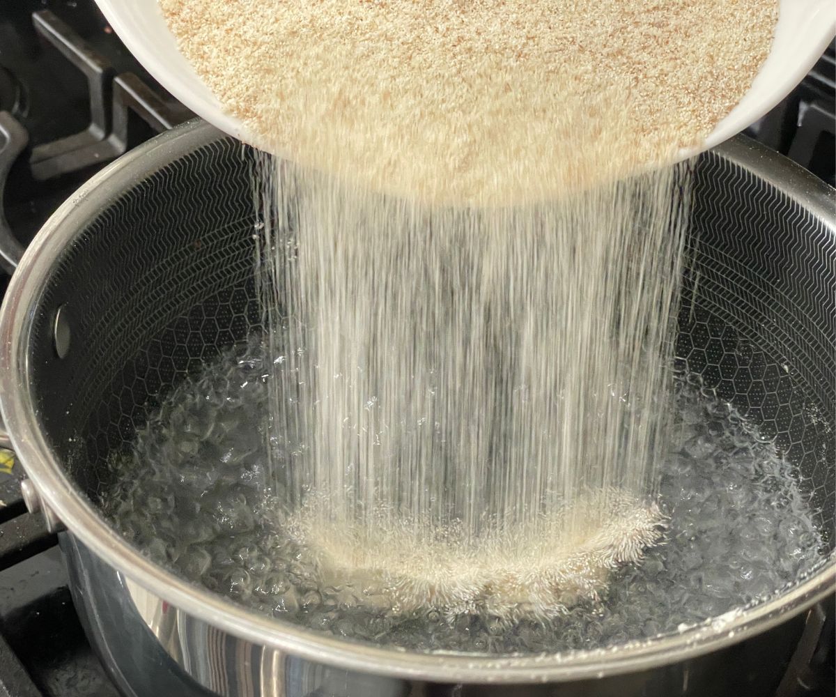 A heated pan is with rava mixture.