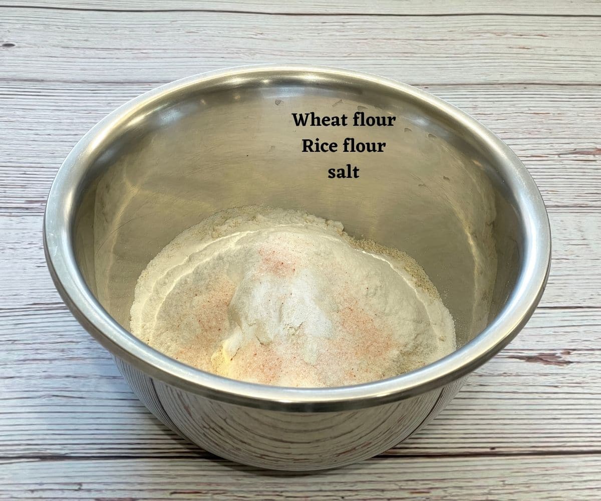 Wheat flour dosa ingredients are inside the bowl.
