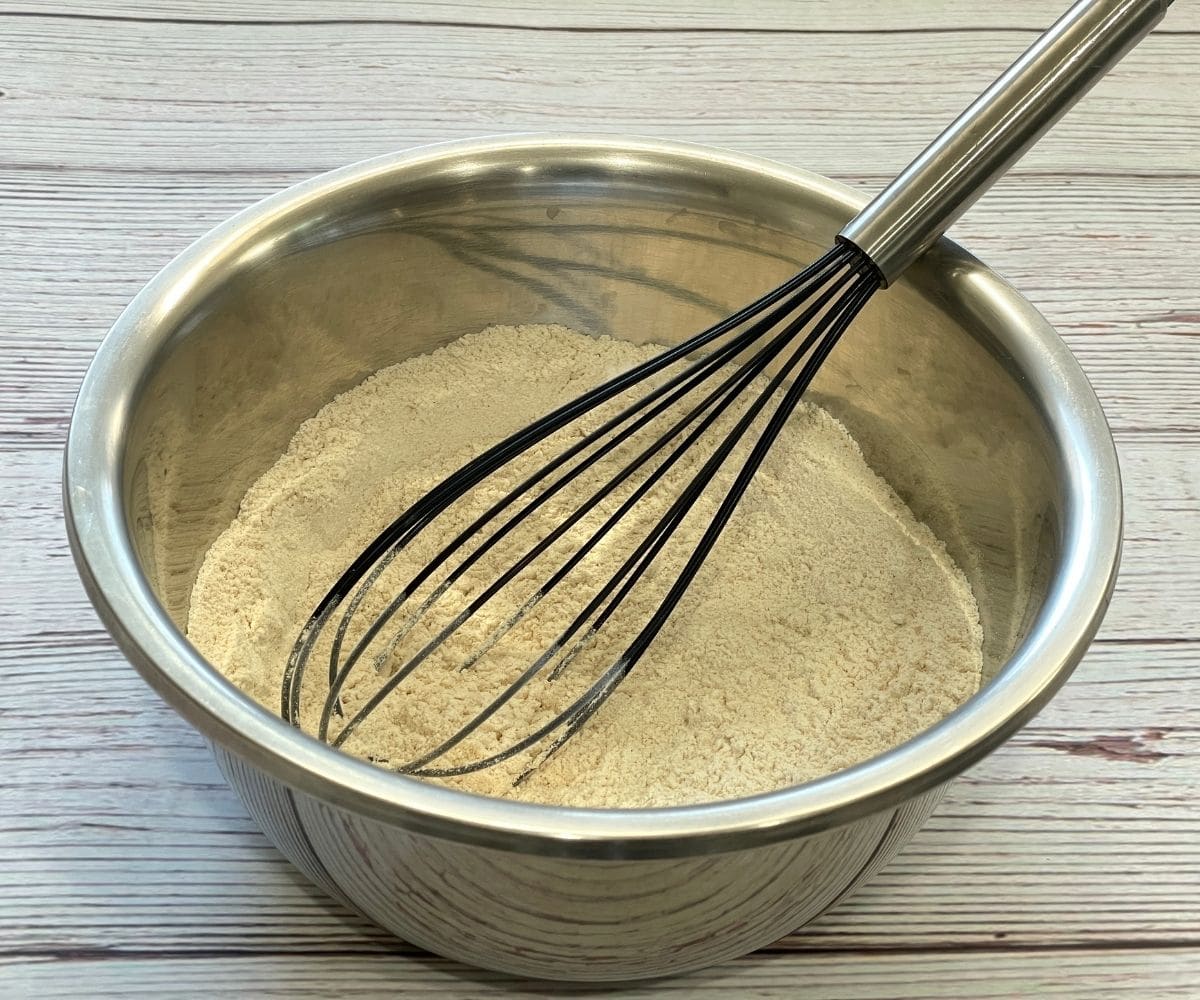 a bowl is with wheat flour, rice flour and salt.