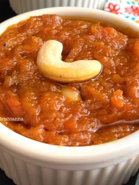 A bowl of carrot halwa on a plate