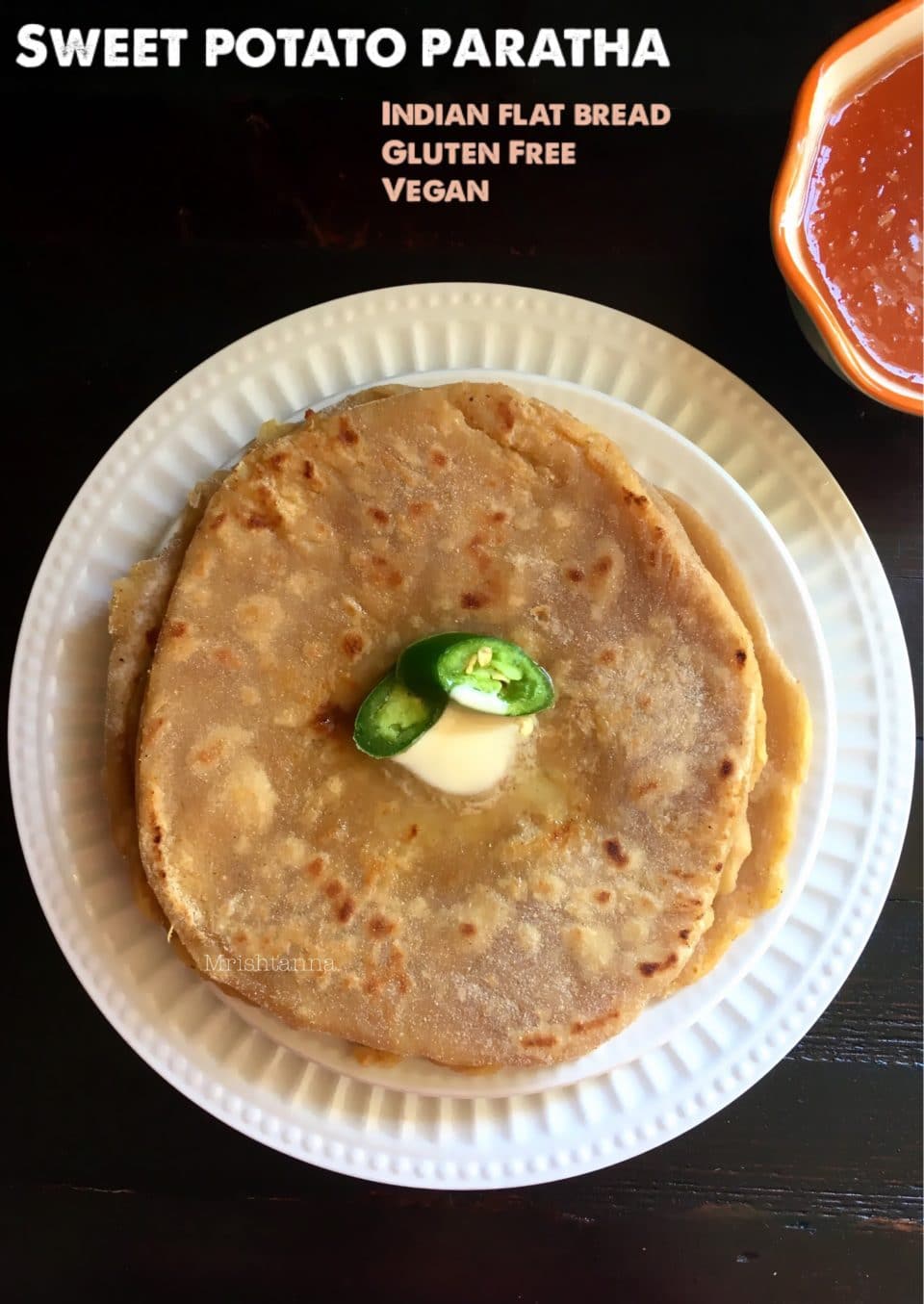 A plate of food on a table, with Bread and Dough