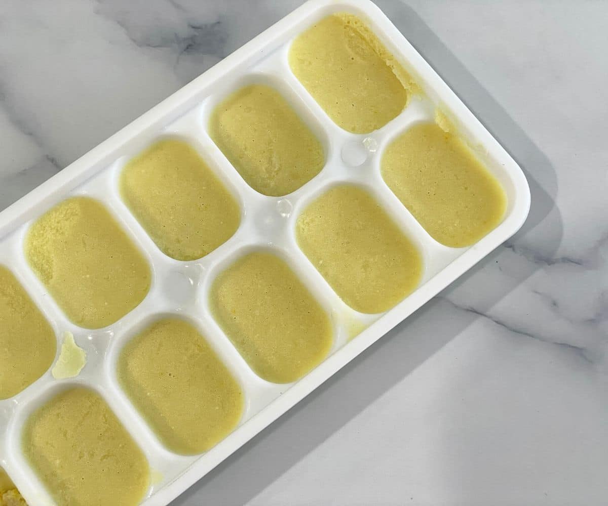 Silicone ice tray is with vegan butter spread.