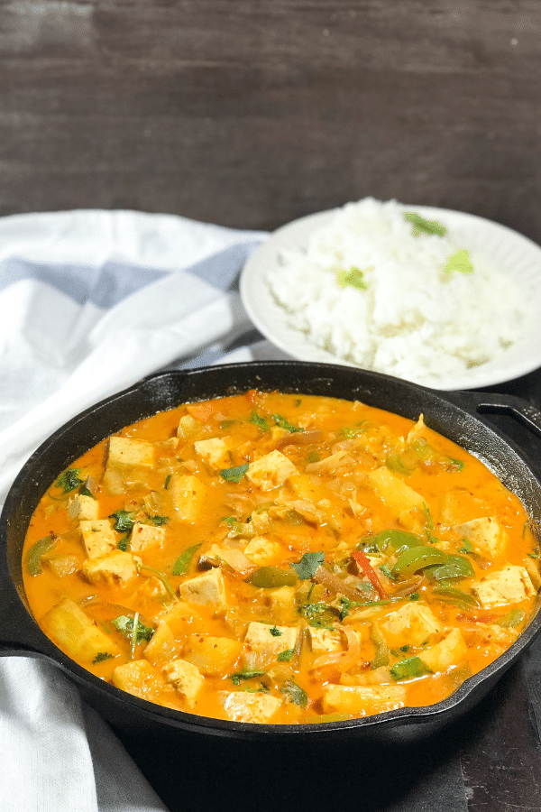 A bowl of food, with Curry and Tofu