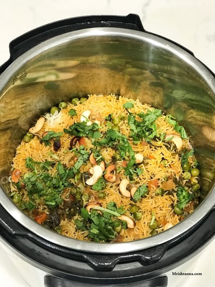 Instant Pot filled with pudina rice and nuts