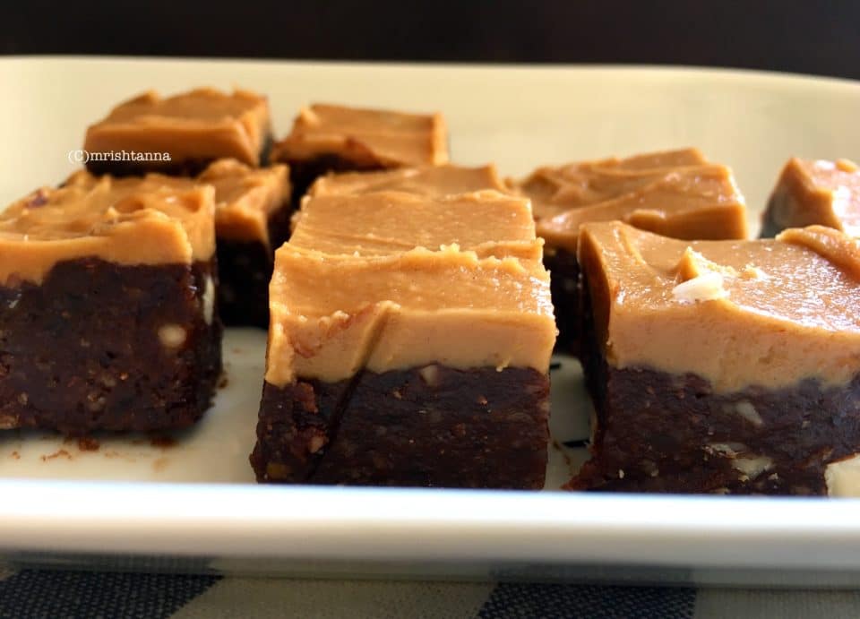 A piece of fudge on a plate, with Fudge and Almond