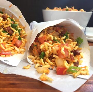 A plate of food on a table, with Puffed rice and Spice