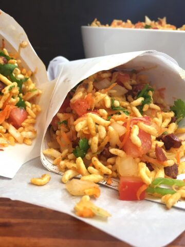 A plate of food on a table, with Puffed rice and Spice