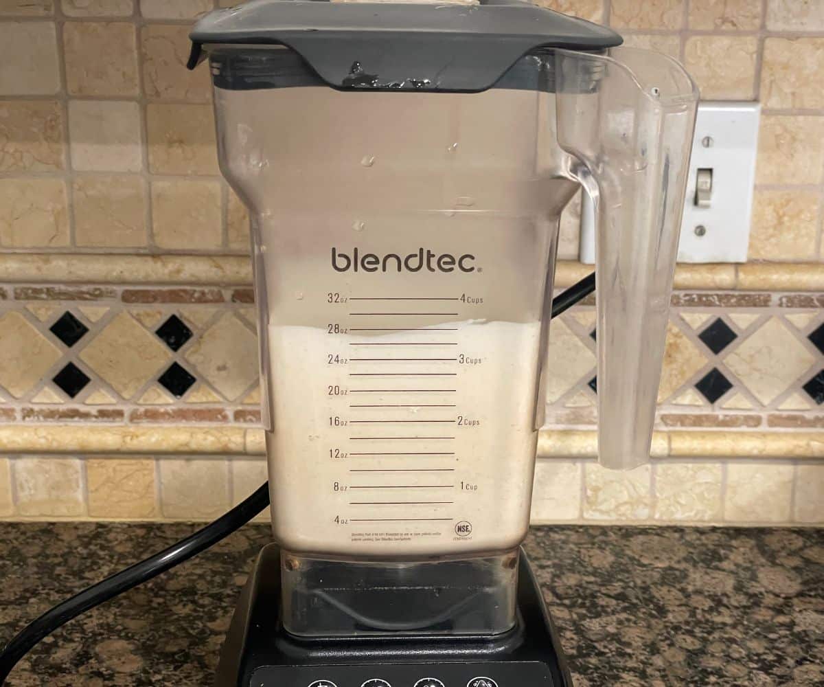 A blender is with quinoa dosa batter.