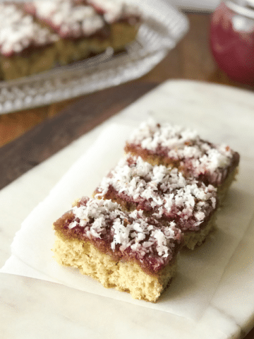 A piece of vegan honey cake on a plate