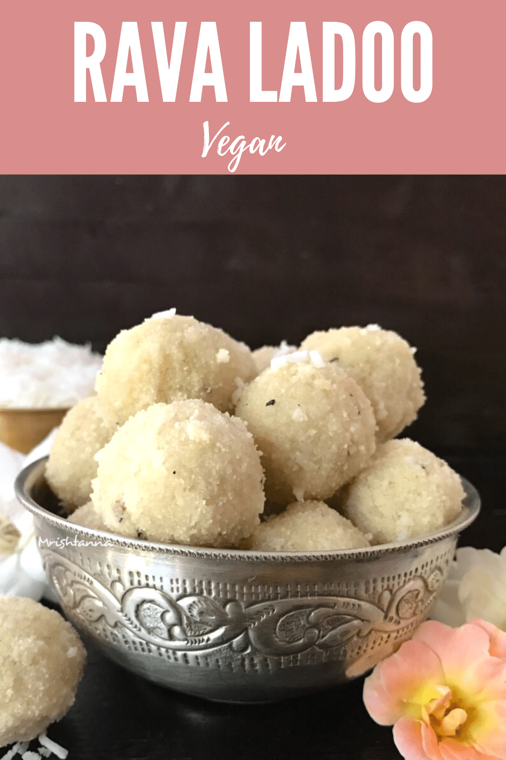 A box filled with different types of food, with Laddu and Coconut