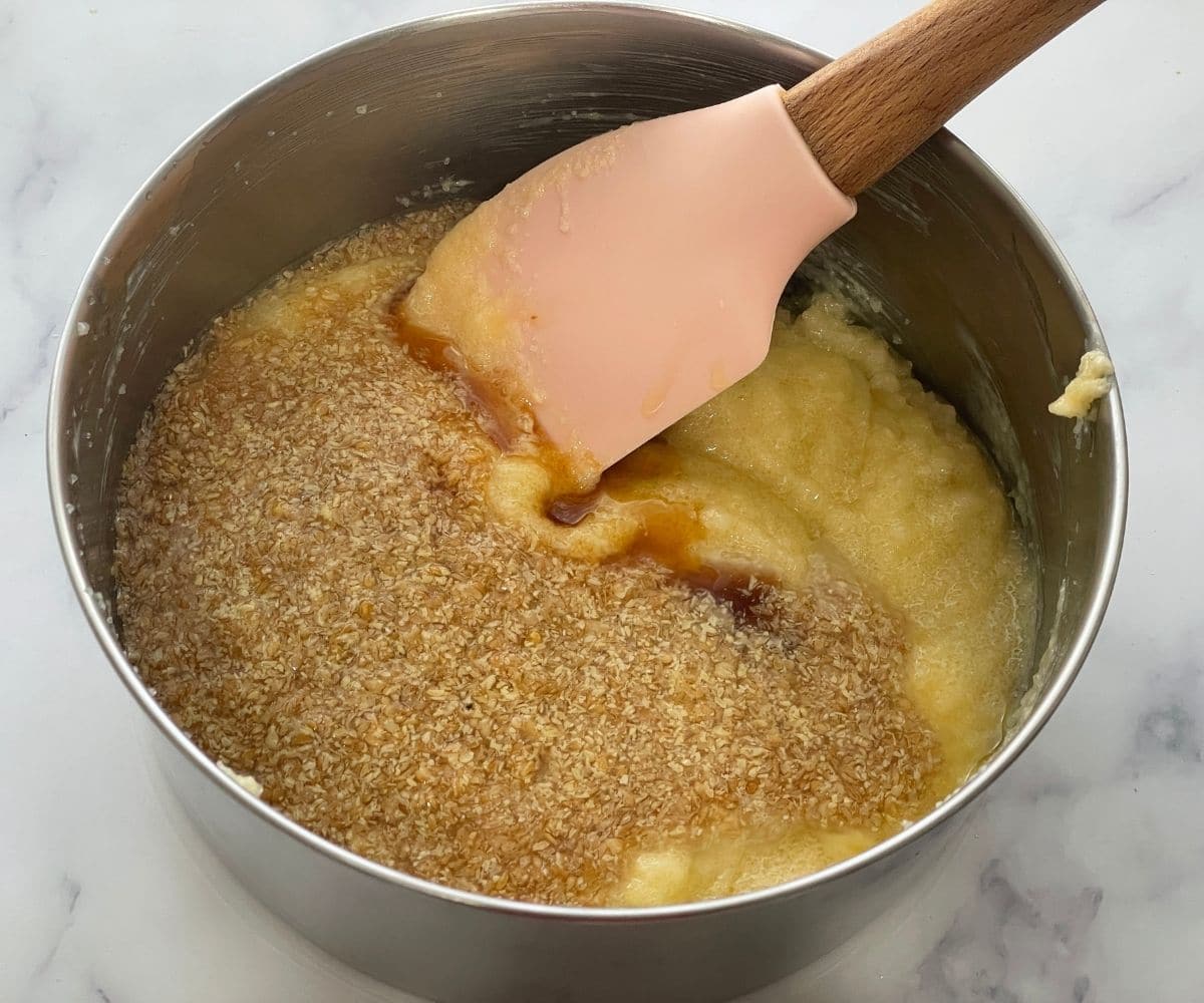 A bowl is with wet ingredients and flax meal to make vegan cookies. 