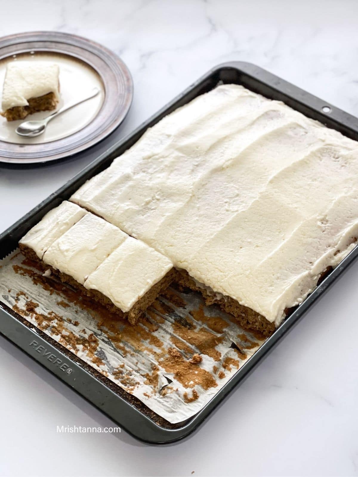 A tray is with vegan banana cake on the marble table