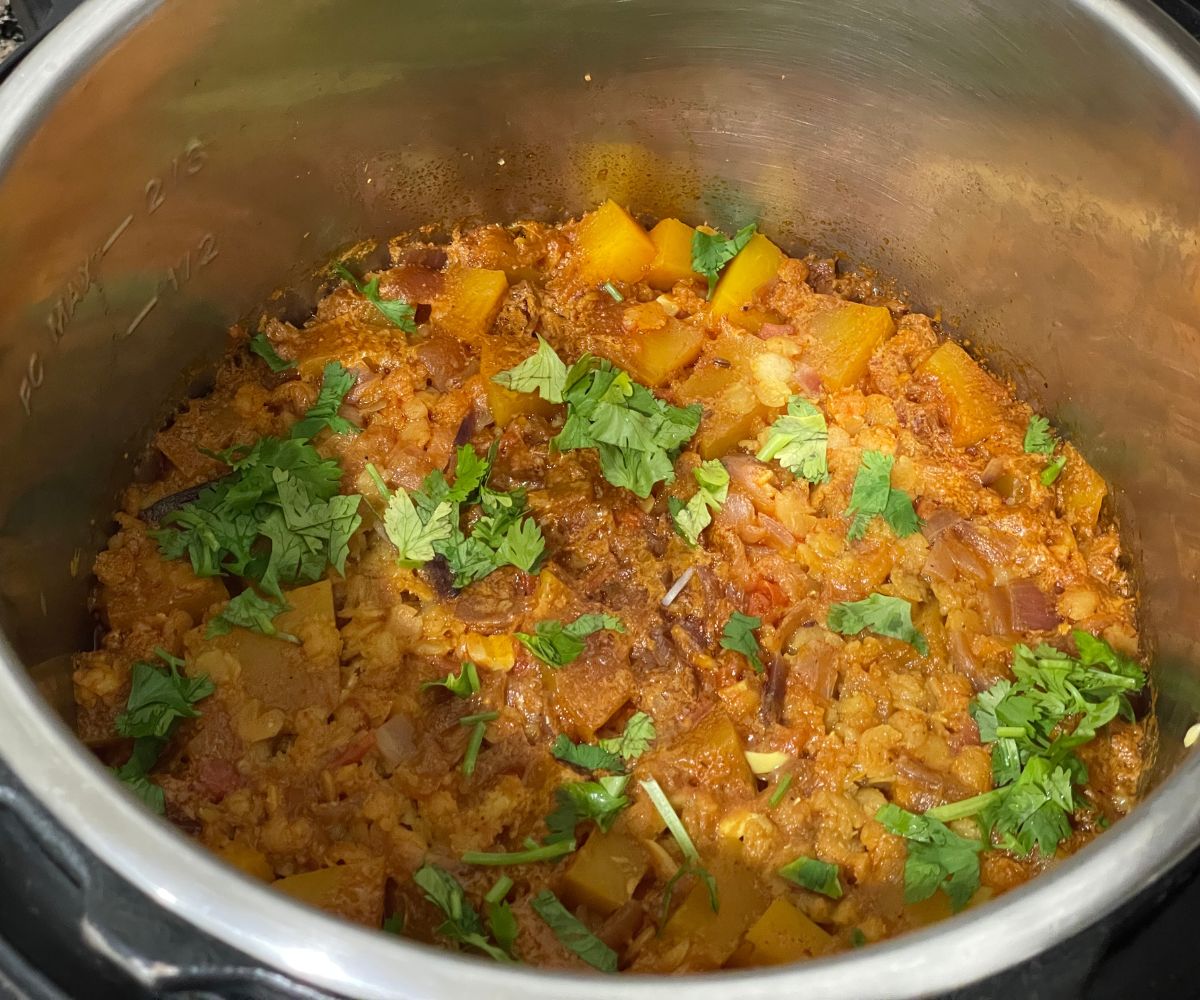 A pot is with pumpkin dal.