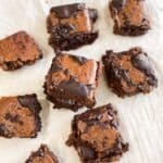 Air fryer vegan brownies are on the white tray.