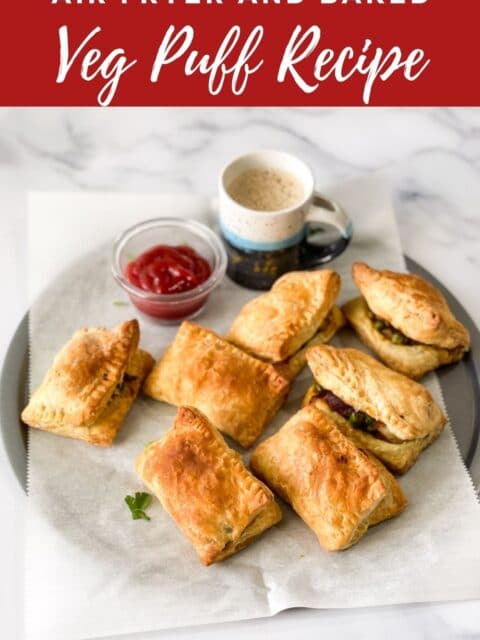 A tray of veg puff is on the table.