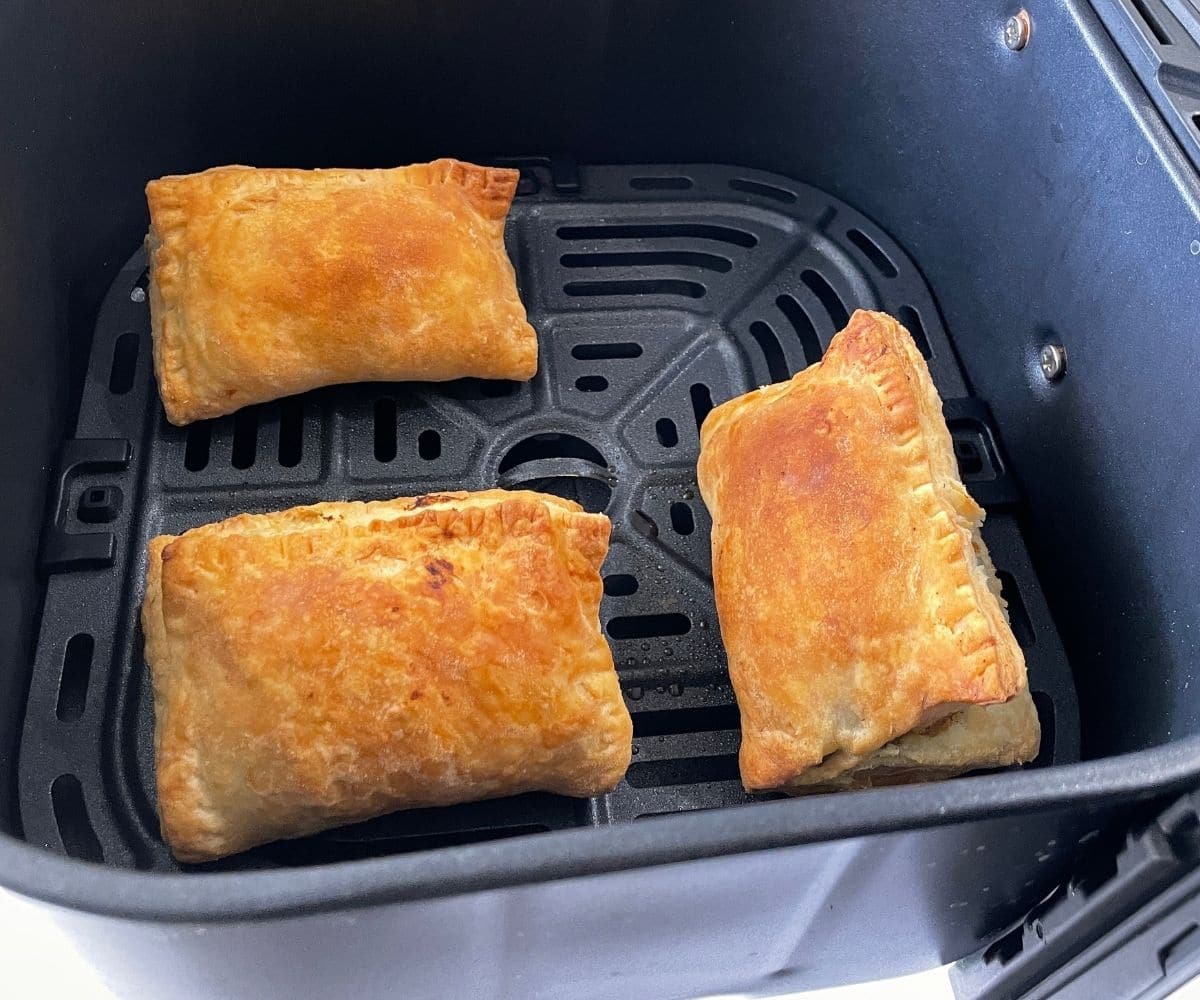 Air fried veg puff are inside the basket.