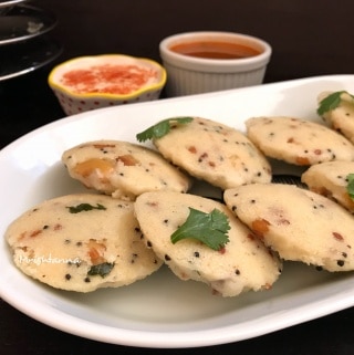 A plate of food, with Rava idli