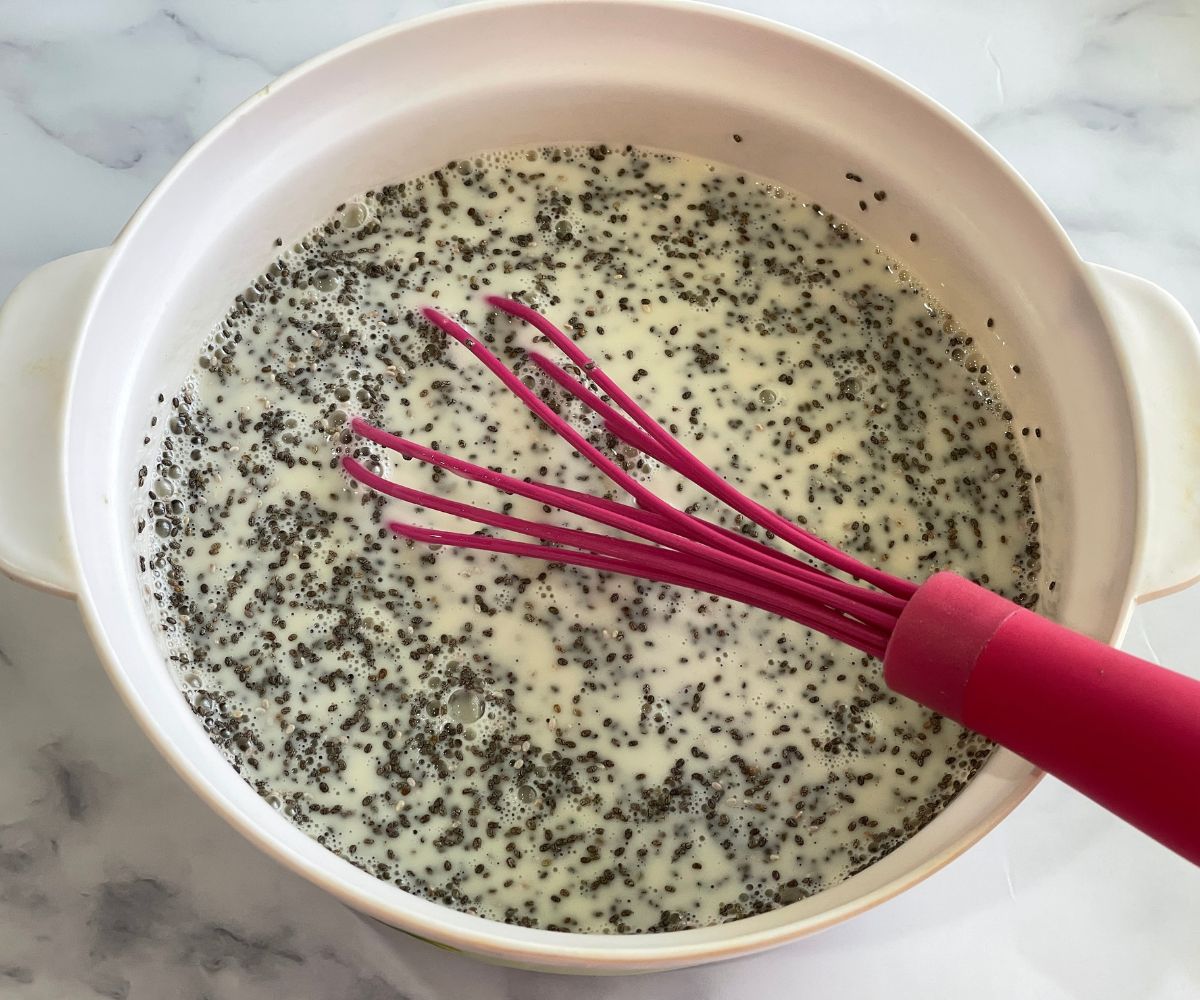 A bowl is with oat milk chai pudding mixture.