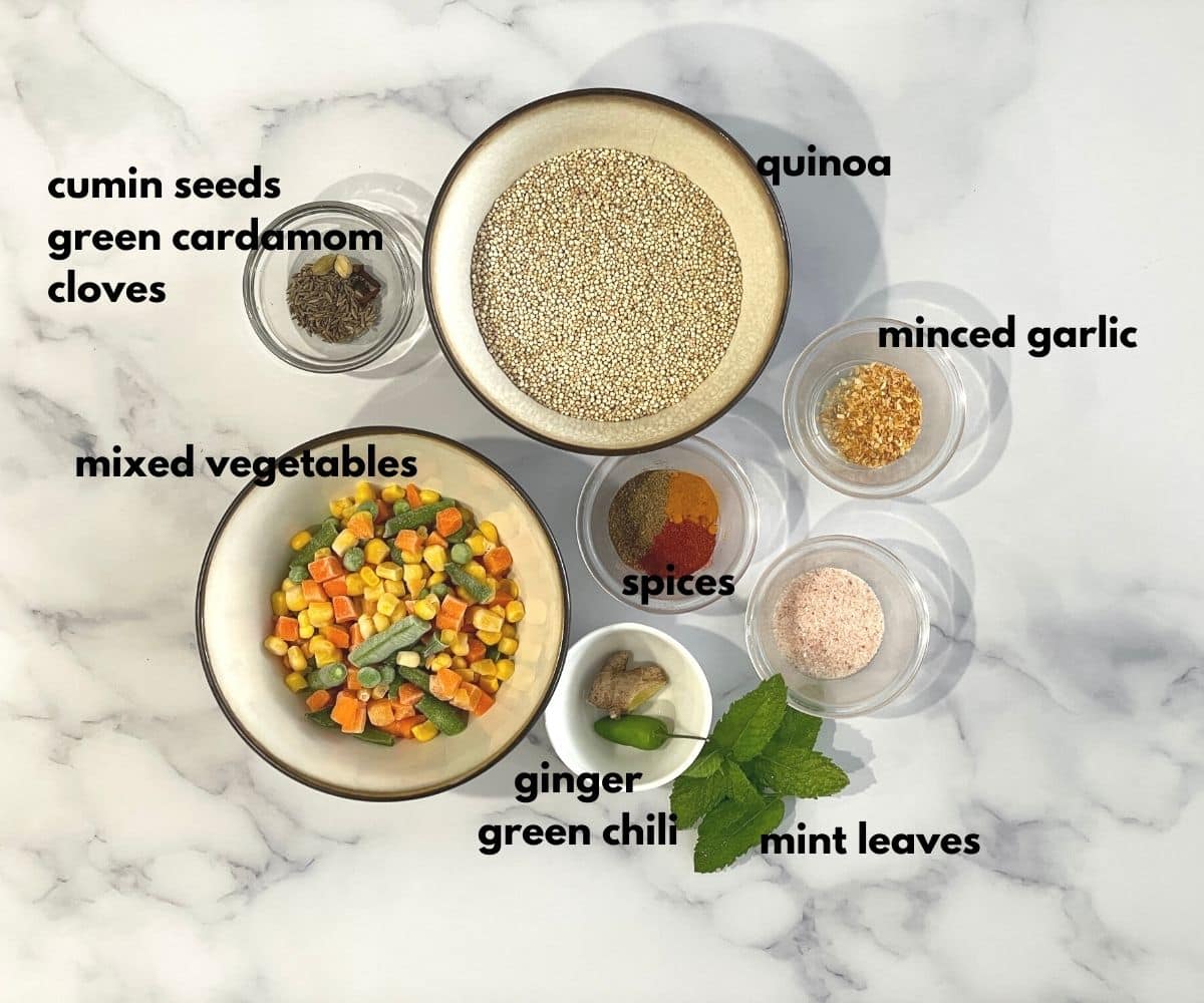 Quinoa pulao ingredients are on the table.