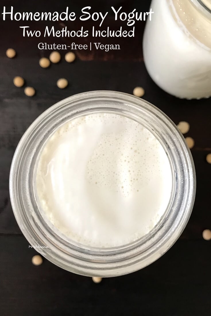 A jar of Soy yogurt on the black surface 