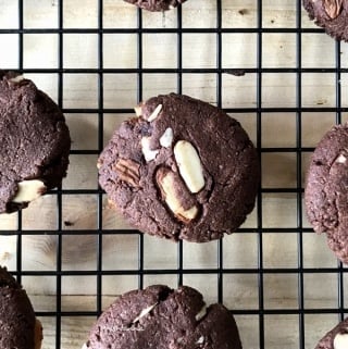 Almond cocoa cookies are on the cooling wire rack