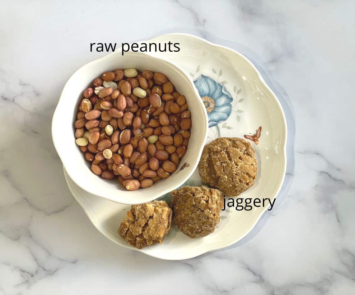 A plate is with raw peanuts and jaggery.