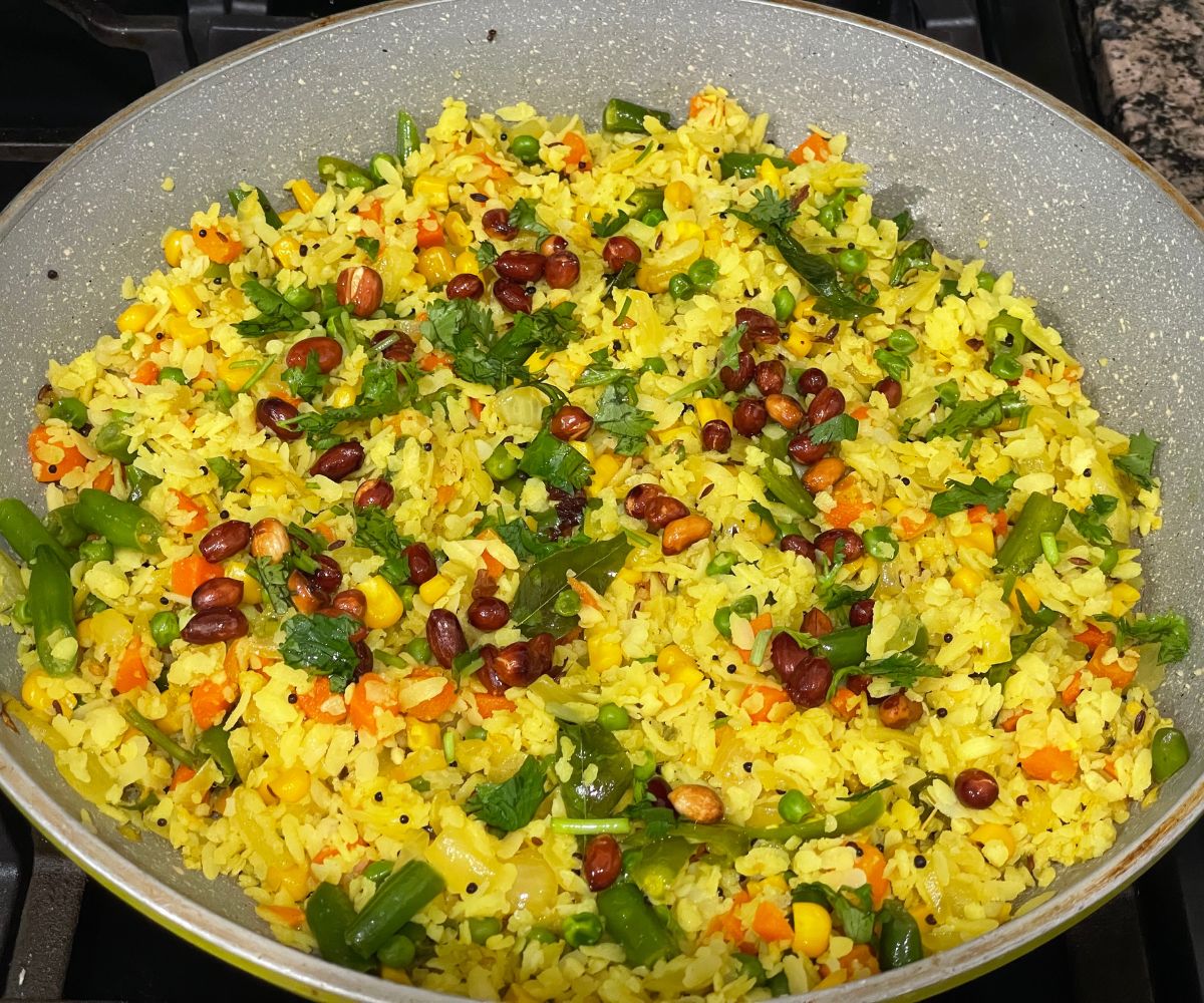 A pan is with vegetable poha.